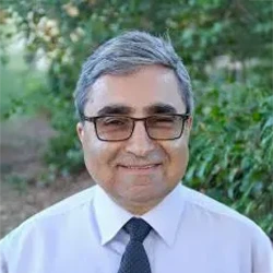 A headshot photo of Dr. Greg Rubin, the dentist at 1000 Smiles Dental Group