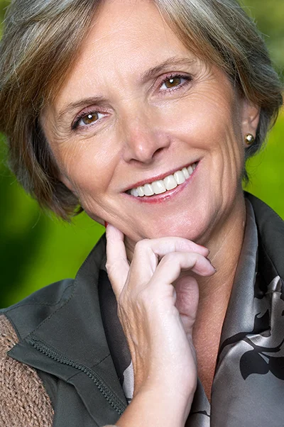 Dentist Thousand Oaks CA Woman Smiling with Straight Teeth A middle aged woman smiling, showing her straight white teeth